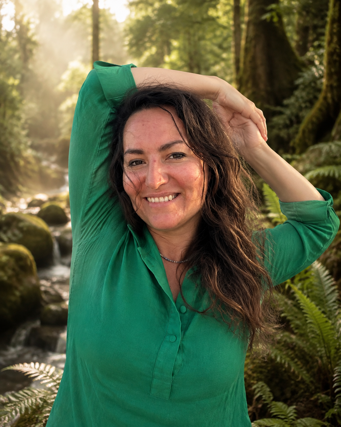 Eva demonstrating a standing yoga pose in a woodland clearing